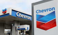 A court in Ecuador upheld a 2011 ruling requiring US oil giant Chevron to pay $9.5 billion for environmental damage in the Amazon rainforest. (AFP Photo/Justin Sullivan) A court in Ecuador upheld a 2011 ruling requiring US oil giant Chevron to pay $9.5 billion for environmental damage in the Amazon rainforest. (AFP Photo/Justin Sullivan)