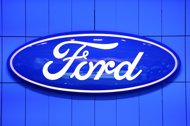 Ford reported a fourth-quarter profit surge, boosted by strong North America sales and a huge special tax item. Ford reported a fourth-quarter profit surge, boosted by strong North America sales and a huge special tax item.