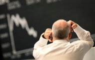 A trader works at the stock exchange in Frankfurt in 2011. European stock markets edged ahead on upbeat US data but sentiment remained fragile as investors worried that Greece could be heading for a potentially disastrous default. A trader works at the stock exchange in Frankfurt in 2011. European stock markets edged ahead on upbeat US data but sentiment remained fragile as investors worried that Greece could be heading for a potentially disastrous default.