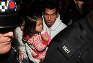 Manchester City's Argentinian footballer Carlos Tevez (C) arrives at Manchester airport on February 14. Tevez looks set to return from his self-imposed exile after apologising to the club for his conduct in recent months. Manchester City's Argentinian footballer Carlos Tevez (C) arrives at Manchester airport on February 14. Tevez looks set to return from his self-imposed exile after apologising to the club for his conduct in recent months.