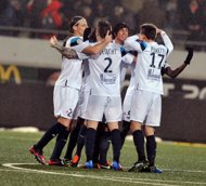 Lille's players celebrate at the end of the French L1 football match Lorient vs Lille on February 18, at the Moustoir Stadium in Lorient, western France. Having stolen a march on their rivals for a Champions League place, Lille can close to within six points of Ligue 1 leaders Paris Saint-Germain if they win at bottom club Sochaux on Wednesday. Lille's players celebrate at the end of the French L1 football match Lorient vs Lille on February 18, at the Moustoir Stadium in Lorient, western France. Having stolen a march on their rivals for a Champions League place, Lille can close to within six points of Ligue 1 leaders Paris Saint-Germain if they win at bottom club Sochaux on Wednesday.