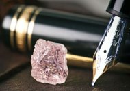 This photo, released by mining giant Rio Tinto on February 22, shows a 12.76 carat pink diamond -- the largest of the rare and precious stones ever found in Australia. Named the Argyle Pink Jubilee, the rough stone was found at Rio's pink diamond operations in the Kimberley region of western Australia and would take 10 days to cut and polish in Perth