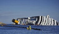Technicians work at pumping out 2,380 tons of fuel from the stricken cruise liner Costa Concordia on January 26. Europe's biggest cruise ship operator was caught up on in the probe into the Costa Concordia tragedy as eight more bodies including a five-year-old Italian girl were found in the wreck. 