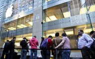 Customers line up outside an Apple store in Sydney on March 16, 2012. Though the iPad's 4G function only works on networks in the United States and Canada it had been widely promoted as one of the tablet's features globally, which the Australia said amounted to false advertising
