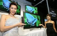 Models of Japan's Toshiba Corp. pose by LCD displays in 2006. Japanese electronics giant Toshiba said Tuesday a jury has ordered it to pay $87 million in a price-fixing case on LCD displays, but that it ultimately may not end up paying damages Models of Japan's Toshiba Corp. pose by LCD displays in 2006. Japanese electronics giant Toshiba said Tuesday a jury has ordered it to pay $87 million in a price-fixing case on LCD displays, but that it ultimately may not end up paying damages