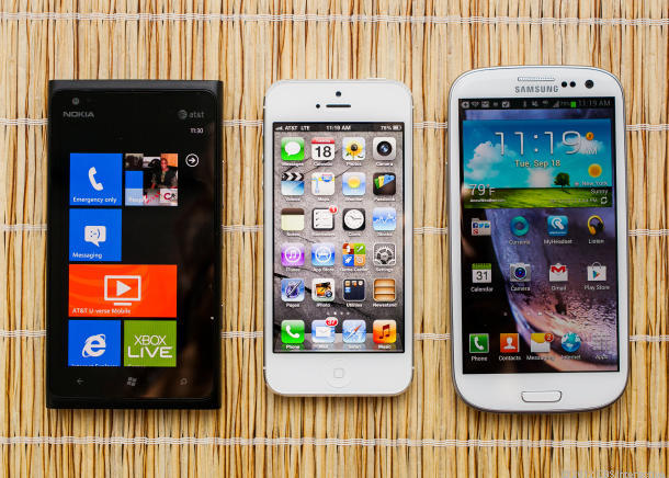 From left: The Lumia 900, iPhone 5, Samsung Galaxy S3.