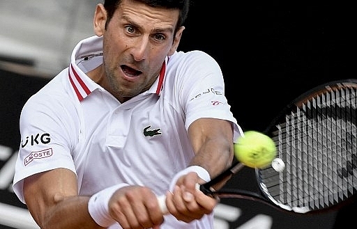 Djokovic sweeps into Italian Open quarter-finals on front of Roman crowd - Vimarsana News