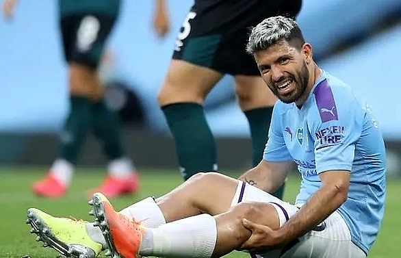 Man City"s Aguero sent to Spain for check on knee injury